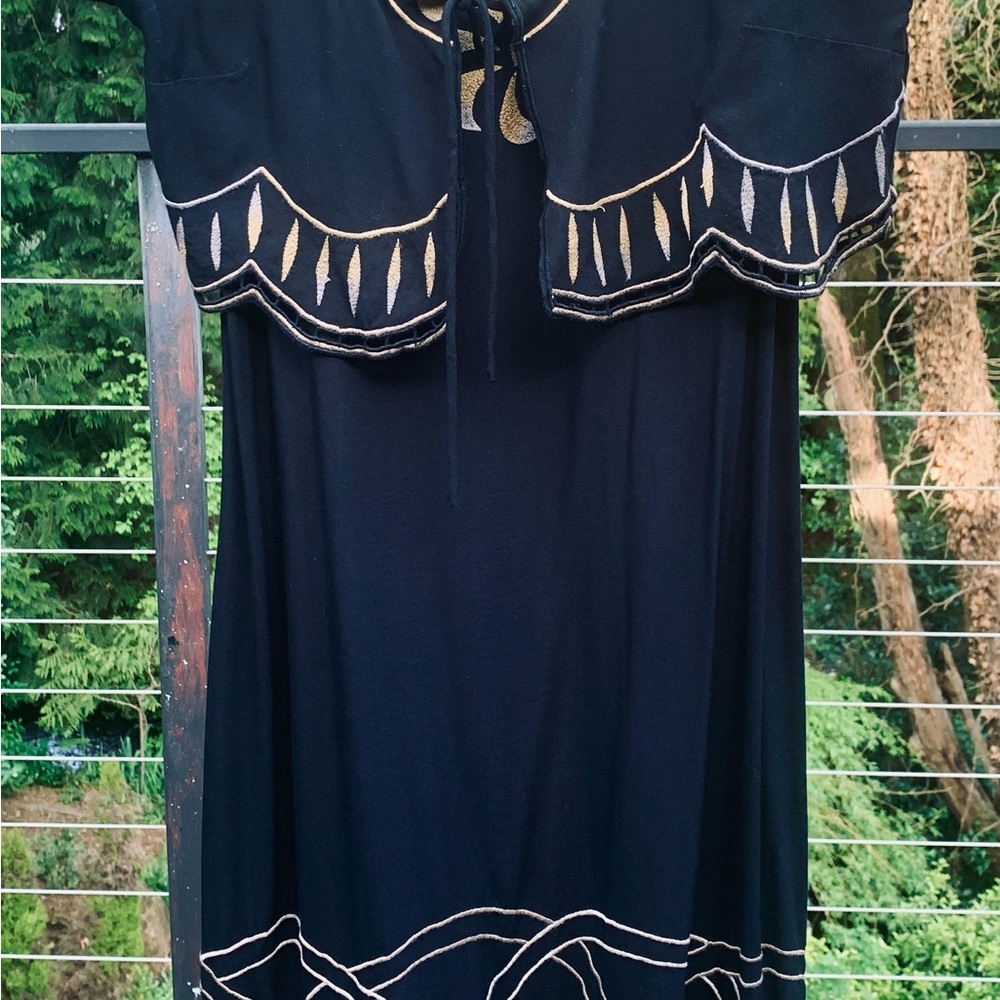 Chic Black Dress with Gold Detailing